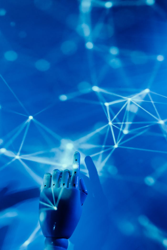 services-01 Futuristic robotic hand touching a digital network on a blue background.